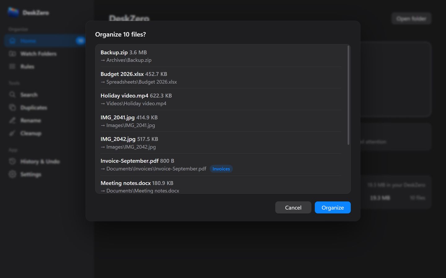 DeskZero in dark mode showing an Organize 10 files? dialog that lists each file and the folder it will move to.